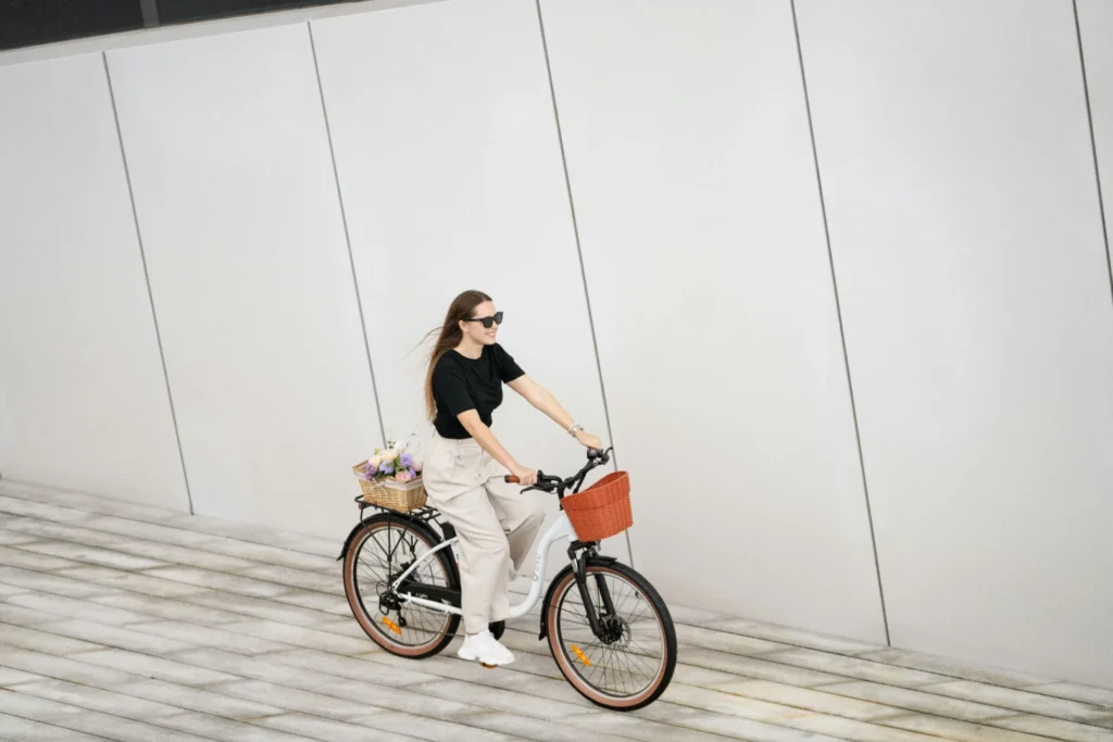DYU C6 Pro e-bike parked by European architecture for an e-bike maintenance schedule